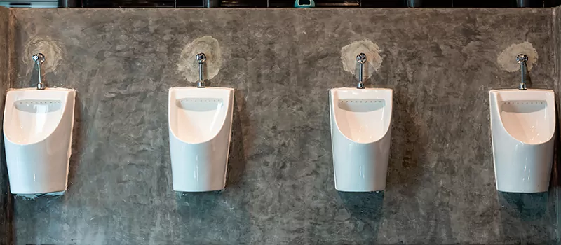 Wall-Mounted Urinal Installation in Downtown Toronto, Toronto